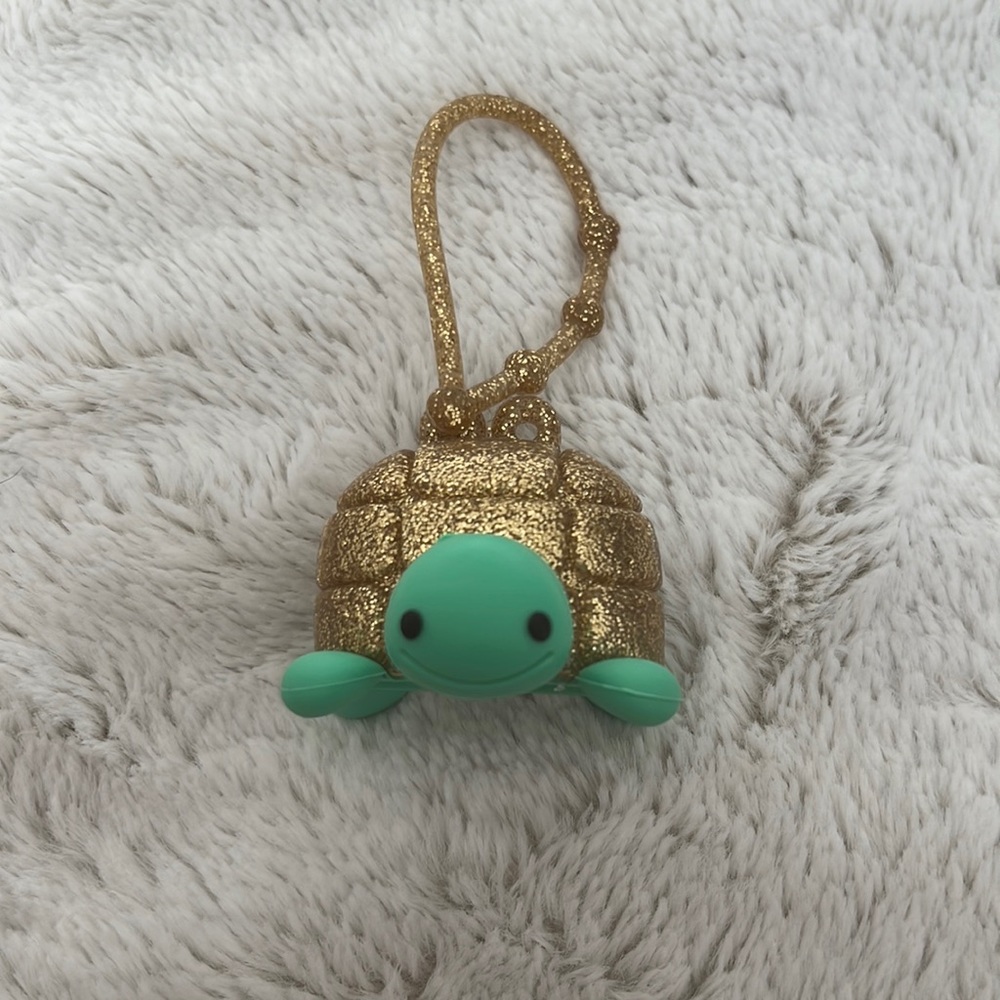 Hand sanitizer holder